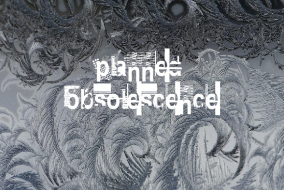 Planned Obsolescence is a decorative display font that immediately catches the eye with its distinctive, worn aesthetic and familiar character forms, making it a compelling choice for designers seeking a typeface with built-in personality and history. Created by Vic Fieger, this font stands out not just for its name but for its unique visual texture, offering a blend of vintage charm and contemporary edge that can elevate a wide range of creative projects. Its faded, textured appearance gives it an authentic, tactile quality that feels both nostalgic and modern, perfect for adding depth and narrative to designs.